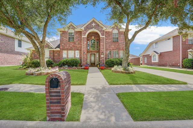 view of front facade with a front yard