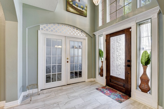 entryway featuring french doors