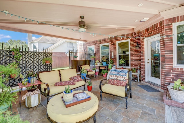 view of patio / terrace featuring ceiling fan and an outdoor hangout area