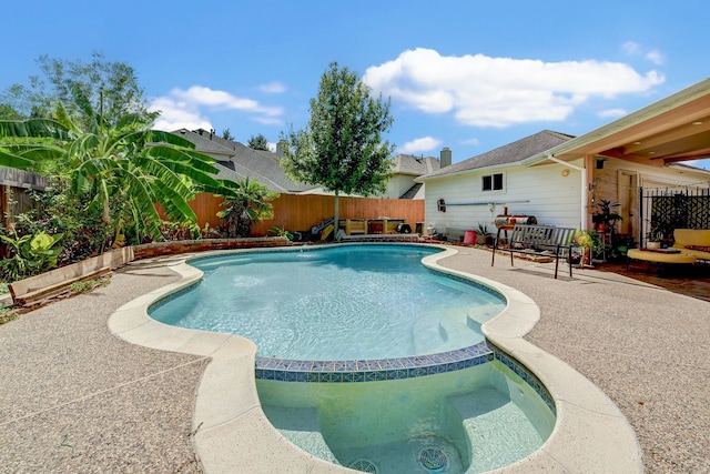 view of swimming pool featuring a patio