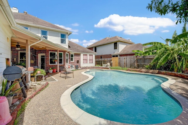 view of swimming pool featuring a patio