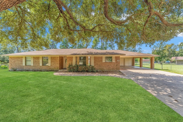 single story home with a carport and a front lawn