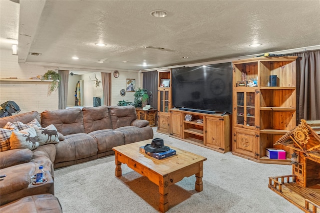 living room with ornamental molding, light colored carpet, and a textured ceiling