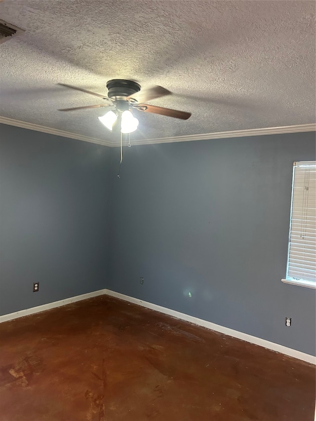 empty room featuring a textured ceiling and crown molding