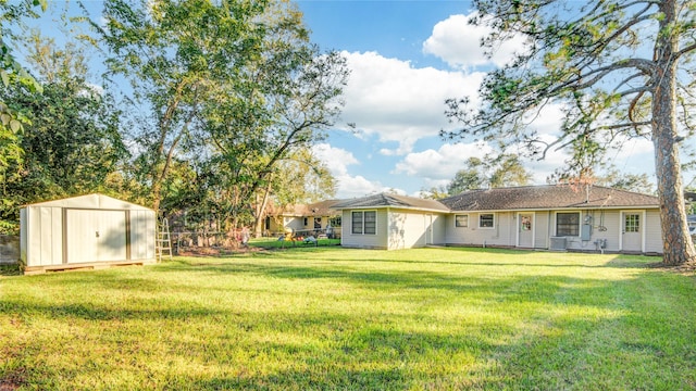 131 Laurel St, Lake Jackson, TX 77566 - view of yard featuring an outdoor structure, central AC, a shed, and fence