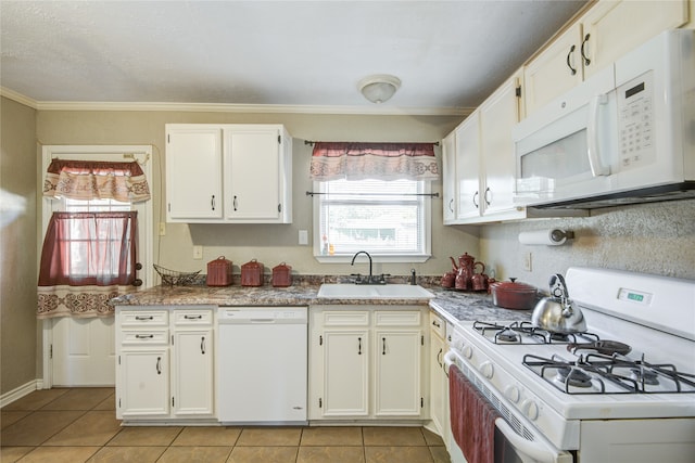 kitchen featuring white cabinets, white appliances, and sink