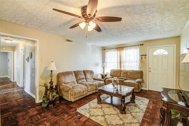 131 Laurel St, Lake Jackson, TX 77566 - living area featuring baseboards, ceiling fan, and visible vents