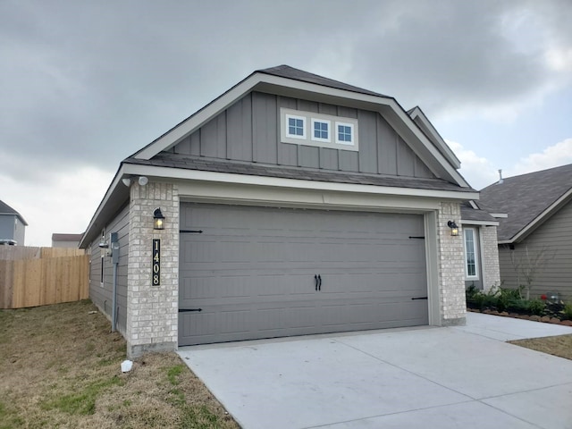 exterior space with driveway and fence