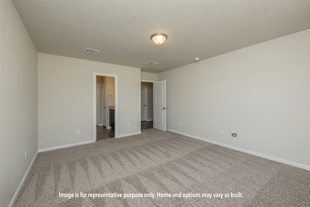 unfurnished bedroom with carpet