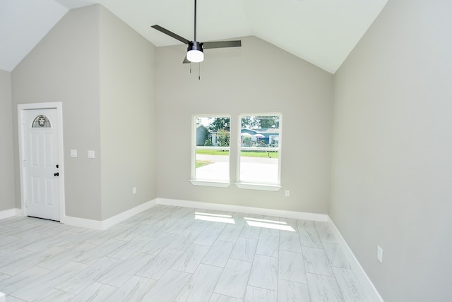 unfurnished room with vaulted ceiling and ceiling fan