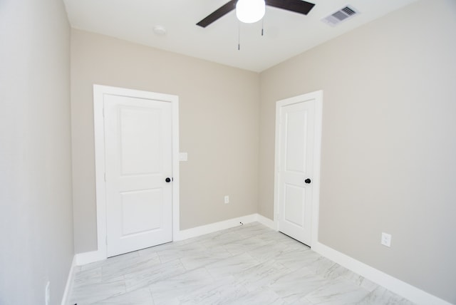 spare room featuring ceiling fan