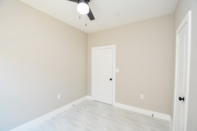 unfurnished bedroom featuring ceiling fan