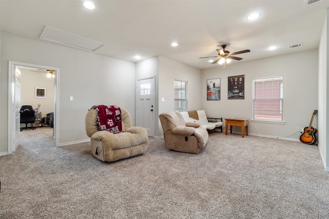 sitting room with carpet floors and ceiling fan