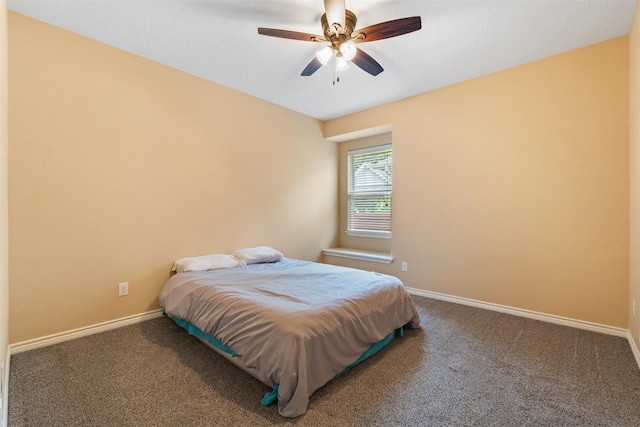 bedroom featuring ceiling fan and carpet flooring