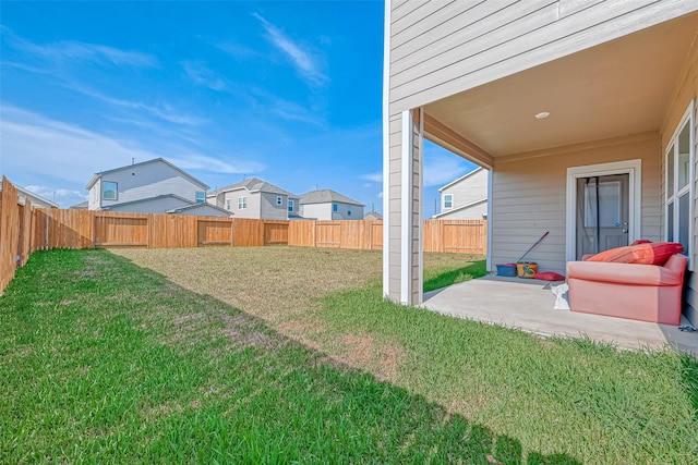 view of yard with a patio area