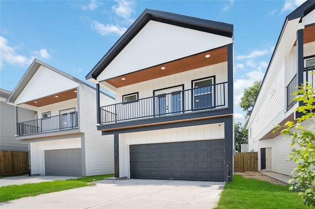 view of front of house with a balcony and a garage