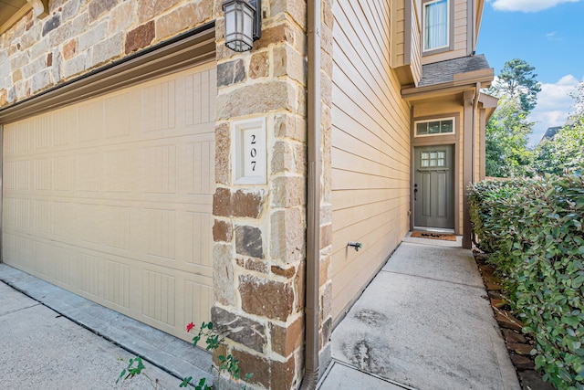 entrance to property with a garage