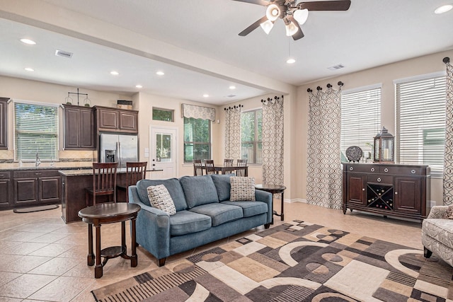 207 Cheswood Forest Pl, Montgomery, TX 77316 - living room featuring light tile patterned flooring, visible vents, ceiling fan, and recessed lighting