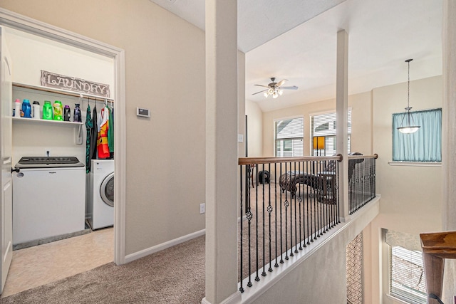 207 Cheswood Forest Pl, Montgomery, TX 77316 - hall featuring carpet flooring, washer and clothes dryer, baseboards, and an upstairs landing