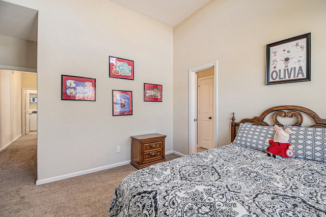 carpeted bedroom featuring high vaulted ceiling