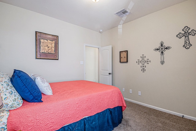 bedroom with vaulted ceiling and carpet flooring