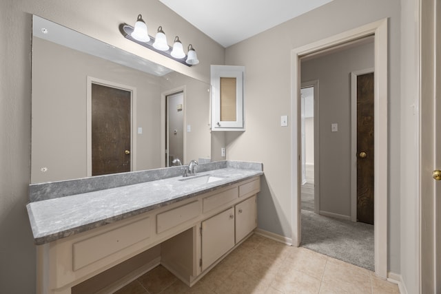 bathroom featuring tile patterned floors and vanity