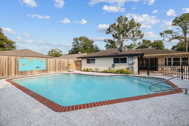 view of pool featuring a patio area