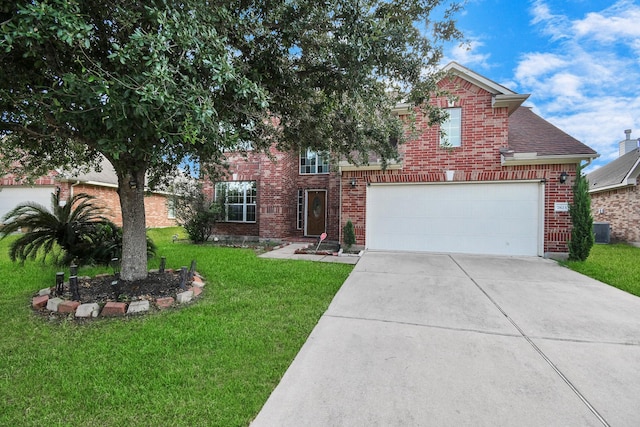 front of property with central AC unit, a garage, and a front yard