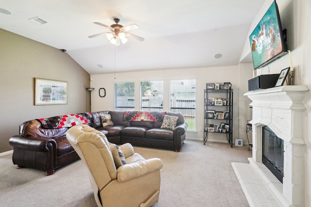 living room featuring light carpet, lofted ceiling, and ceiling fan