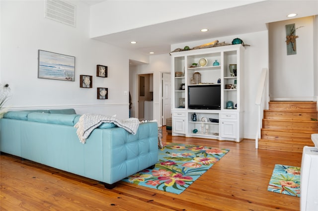 living room with hardwood / wood-style flooring