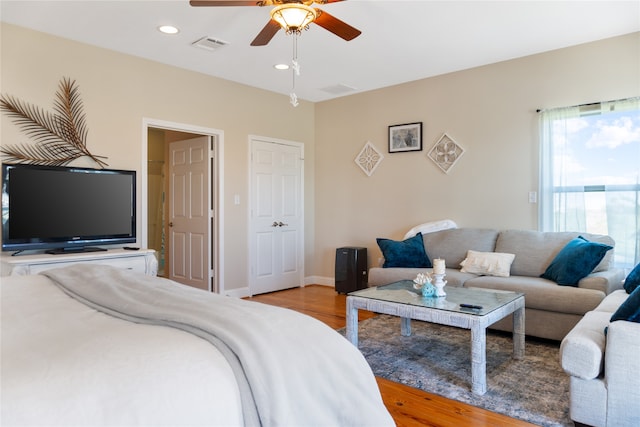 bedroom featuring ceiling fan and light wood-type flooring