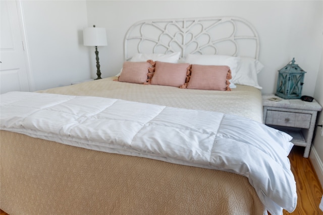 bedroom featuring hardwood / wood-style flooring