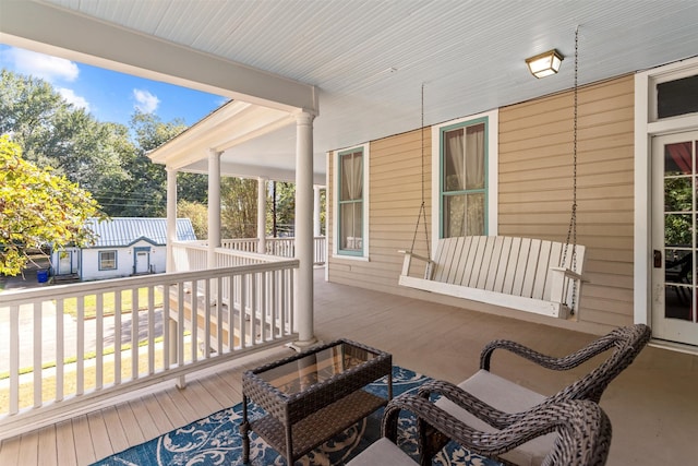 wooden deck with a porch