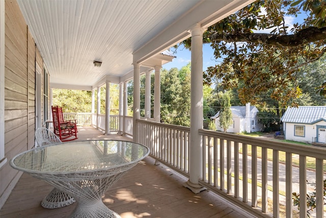 deck with covered porch