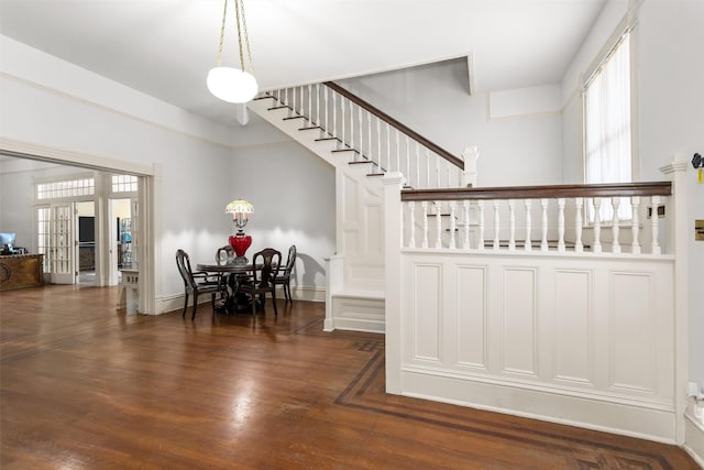 stairs with wood-type flooring