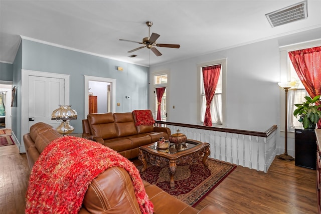 living room with ceiling fan, dark hardwood / wood-style floors, and crown molding