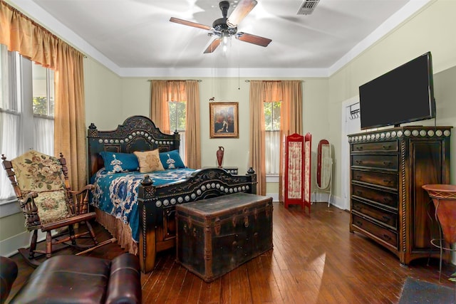 bedroom featuring dark hardwood / wood-style floors and ceiling fan