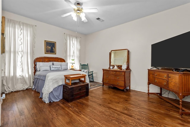 bedroom with wood-type flooring and ceiling fan