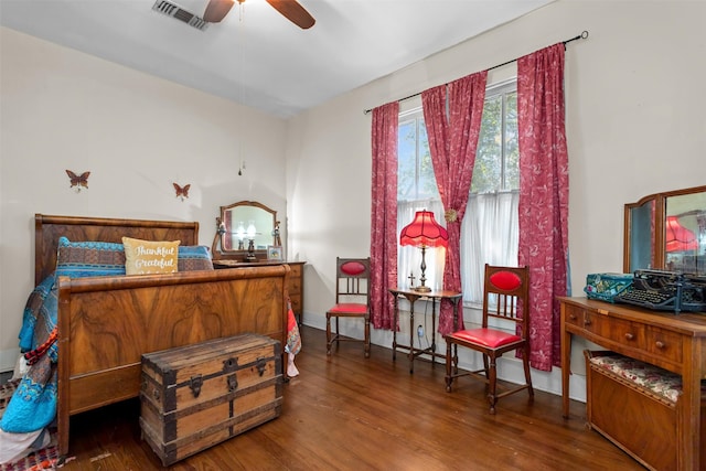 bedroom featuring ceiling fan and hardwood / wood-style flooring