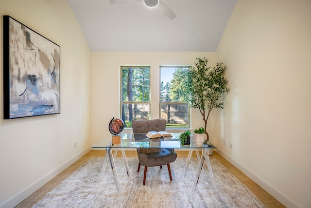 office with lofted ceiling, ceiling fan, and baseboards