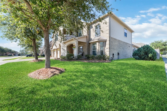 view of front facade with a front yard