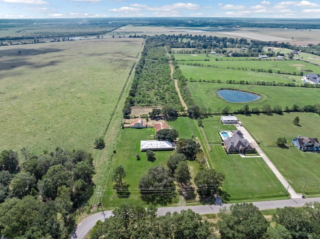 birds eye view of property featuring a rural view