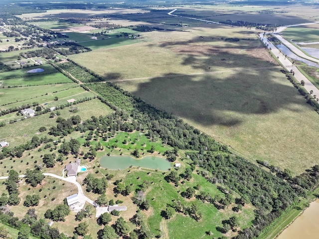 bird's eye view featuring a rural view and a water view