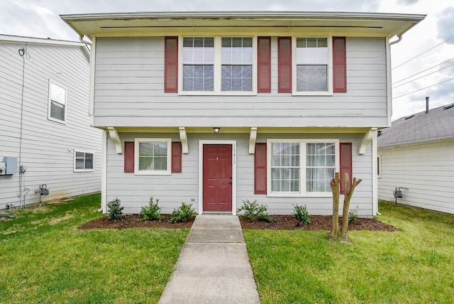 view of front of property with a front lawn