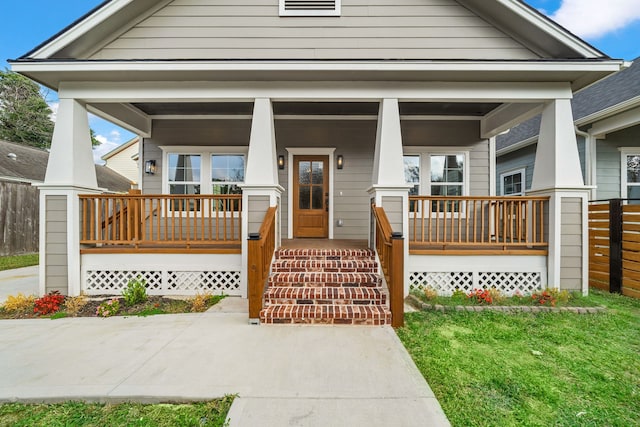 view of front of property featuring covered porch