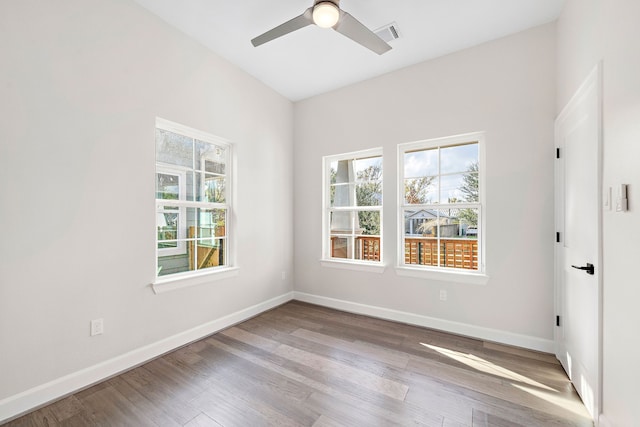 spare room featuring ceiling fan and light wood-type flooring