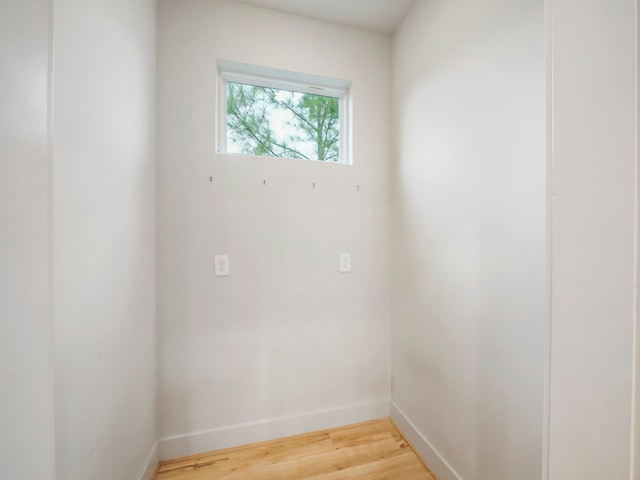 empty room featuring hardwood / wood-style flooring