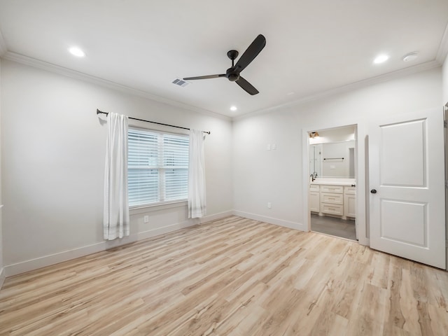 unfurnished bedroom with light wood-type flooring, ensuite bath, ceiling fan, and crown molding