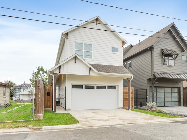 view of front facade featuring a front yard and a garage