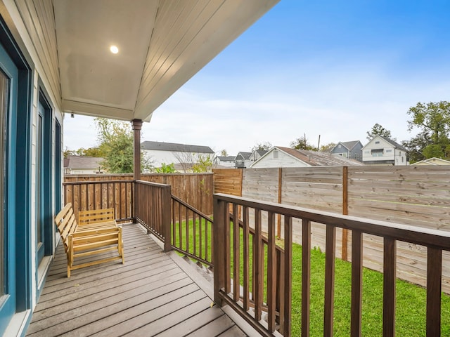 deck featuring a lawn